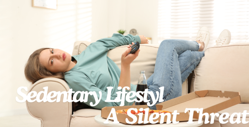 Woman sitting on a couch watching TV, exemplifying a sedentary lifestyle.